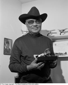 John F. Briggs holding one of his model airplanes #3