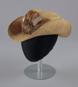 Straw cowboy hat with feathered hat band worn by Arthur Lee