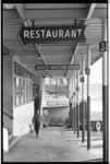 ["White" and "Colored" waiting room signs at a Trailways bus station, Atlanta, Georgia]