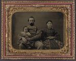 [Unidentified soldier in Confederate 1st lieutenant's uniform with wife and baby]