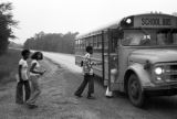 Students boarding a Wilcox County school bus in Gee's Bend, Alabama.