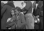 Negroes in the lineup for food at meal time at the camp for flood refugees, Forrest City, Arkansas