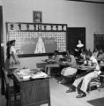 Female student presenting before a class at Nazareth Catholic Mission in Montgomery, Alabama.