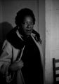 Sallie M. Hadnott, a local civil rights activist, taking off her coat inside the Autauga County Voters Association office in Prattville, Alabama.