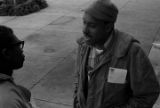 Scott B. Smith of SNCC speaking with John Davis of SCLC, in front of the Barbour County courthouse in Eufaula, Alabama.