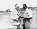 Sprinter Ralph Metcalfe with coach Conrad Jennings, 1932