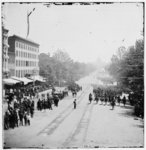 [Washington, D.C. Maj. Gen. Horatio G. Wright, staff and units of 9th Army Corps passing on Pennsylvania Avenue near the Treasury]