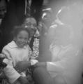 Martin Luther King Jr. with Sheyann Webb and Rachel West at the first rest stop on the Selma to Montgomery March, two miles outside of Selma, Alabama.