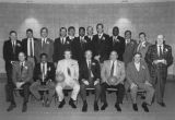 The 1969-1970 Marquette men's basketball team and coaches pose for a group photo celebrating the team's 20th anniversary, 1990