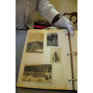 Stephen Hunter poses with his family photo album