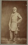 [General Robert E. Lee, full-length portrait, standing, facing front, with left hand at waist, on sword, wearing military uniform]