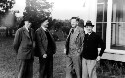 Unidentified group of men. Jackson Davis wearing a hat