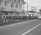 Sidney Lanier High School band marching during the opening ceremonies for the campaign headquarters of Congressman Bill Dickinson in the Guaranty Savings Life Building on Montgomery Street in downtown Montgomery, Alabama.