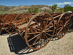 Old-style handcarts at the Martin's Cove Mormon Handcart historic site in Sweetwater County, Wyoming. The site, on the old Mormon and Oregon trails (and the California Trail and Pony Express route as well, which all followed similar routes before diverging in what is now western Wyoming), recalls the Mormons' westward migration after they were forced from their village in Illinois. Many Mormon emigrants pulled their families and/or possessions in crude handcarts on the arduous journey.  These carts are used for school-group tours, when youngsters are invited to pull their classmates around the grounds