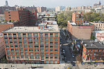 View west from the roof of the St. Nicholas Houses along W. 128th St. from Frederick Douglass Blvd., Harlem, 2016