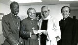 Group Portrait of Bishop Keeler giving Monsignor Lenz the Harrisburg Diocese's Contribution to the Annual Lenten Collection, Harrisburg, Pennsylvania, 1988