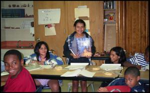 Girl with Nutcracker Book in Gates Elementary Classroom