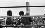 Mike Weaver and Michael Dokes in the boxing ring, Las Vegas, 1983