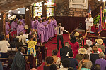 A trumpeter plays and the choir sings and claps during a service at the Emanuel African Methodist Episcopal Church in Charleston, South Carolina, in April of 2017, ten months after a notorious mass murder during a prayer service there