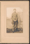 [Lieutenant Arthur H. Perkins of Co. I, 5th New Hampshire Infantry Regiment in uniform in front of painted backdrop showing military camp]