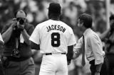 Thumbnail for Bo Jackson shaking hands with a man during a Birmingham Barons baseball game in Birmingham, Alabama.