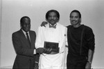 Jimmy Robbins and Byron Miller posing with Bene Coleman at the Pied Piper nightclub, Los Angeles, 1985