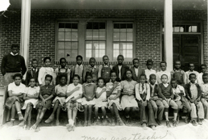 Charles Maxey with his class in Texas