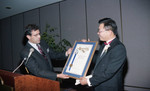 Stewart Kwoh accepting an award, Los Angeles, ca. 1989