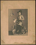 Thumbnail for [Boy in colonel's coat on decorated tricycle for the United Confederate Veterans reunion, Dallas, Texas, 1902]