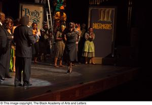 Curtis King, Erykah Badu, and Dereque Whiturs on Stage with Performers