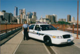 Police Officer With Cruiser