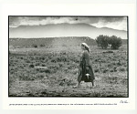 Denise bringing coffee to the workers building their first adobe house at the New Buffalo Commune. Arroyo Hondo, NM 1967