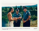 Reno Myerson answering questions of the state police at Hog Farm Camp in the mountains of New Mexico. 1968