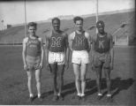 Olympic sprinter Ralph Metcalfe and three other runners at Marquette Stadium, 1933