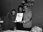 Pat Russell and David S. Cunningham, Jr. posing with and Lois Anderson, Los Angeles, 1989