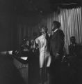 Pauline Sledge and Ray Quarles performing on stage with the Sheiks at the Laicos Club in Montgomery, Alabama.