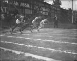 Sprinters leaving blocks of 100-meter dash, 1932