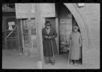 Negro residents of Mound Bayou, Mississippi in front of restaurant, former theater