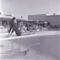 Film negatives of a showgirl at the Moulin Rouge swimming pool, May 22, 1955