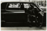 Driver waiting outside Bonwit Teller, New York City