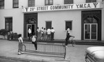 28th Street Y.M.C.A. grand opening participants gathering outside, Los Angeles, 1984