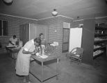 Women working in the kitchen at Camp Rotary in Elmore County, Alabama.