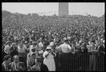 [Woman with camera and crowd at the March on Washington, 1963]