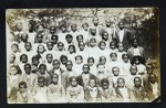 Unidentified groups of people and buildings, Texas