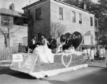 Students from the Allen Institute on a Mardi Gras float in an African American neighborhood in Mobile, Alabama.