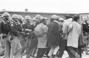 Alabama state troopers pushing civil rights marchers on Bloody Sunday in Selma, Alabama.