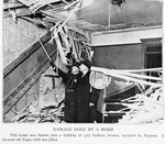 Damage done by a bomb; This bomb was thrown into a building at 3365 Indiana Avenue, occupied by Negroes; A six-year-old Negro child was killed