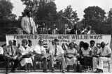 Man speaking during the dedication of Willie Mays Park in Fairfield, Alabama.