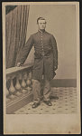 [Corporal Albert O. Blanchard of Co. H, 34th Massachusetts Infantry Regiment in uniform with snake belt buckle]