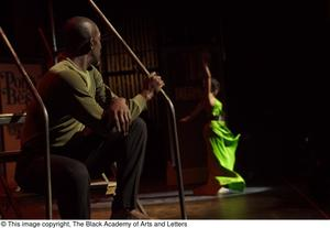 Performer in green dress dancing